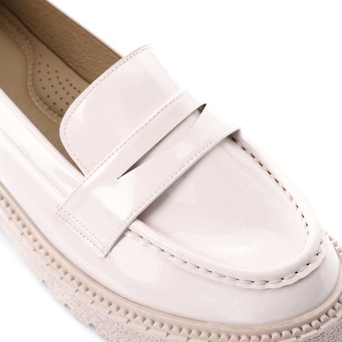Tassel loafers in shinny beige faux leather