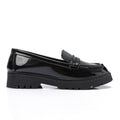 Tassel loafers in shinny black faux leather