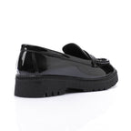 Tassel loafers in shinny black faux leather