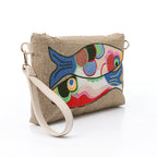 CLUTCH THE FOLKLORIC WRISTLET